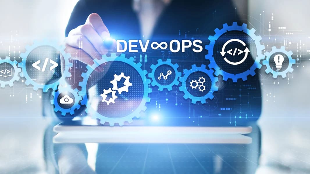 A factory worker looks at machine data focusing on monitoring OEE production efficiency