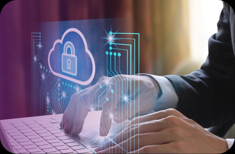 Person typing on a keyboard with a digital overlay of a cloud security lock icon and circuit lines.