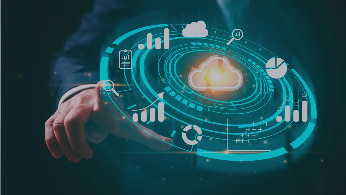 A high-tech graphic shows a person’s hand in a business suit interacting with a holographic interface. The interface features icons representing cloud computing, such as a cloud symbol, bar graphs, pie charts, and binary code. This image visually conveys the advanced and automated nature of serverless application testing, aligning with the blog article “Automated testing of serverless applications: 6 key takeaways from AWS re:Invent Dev Chat.”