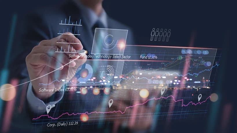 Data analyst presenting financial charts and analytics on a virtual screen.
